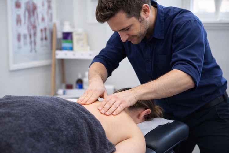 guy giving lady trigger point massage